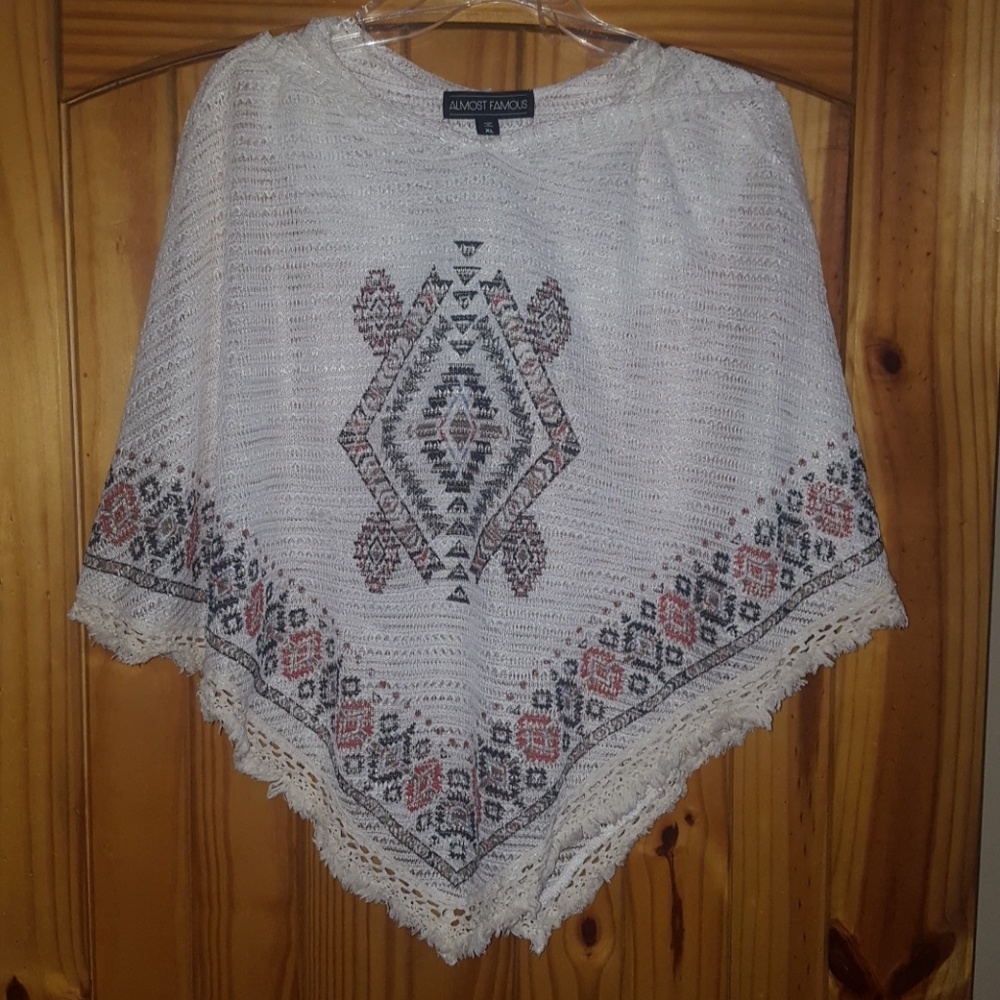 Ivory poncho by Almost Famous